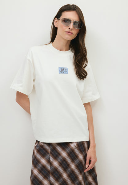 Kremowy t-shirt oversize PARADISO z logo