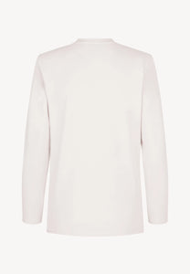 Kremowy longsleeve z poduszkami na ramionach MELISSANDRA