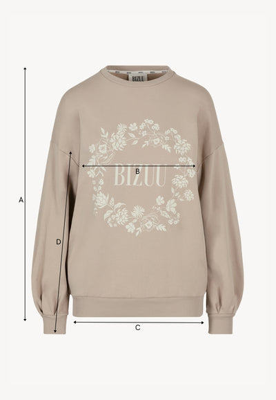 Beżowa bluza oversize z kwiatową aplikacją ORISA