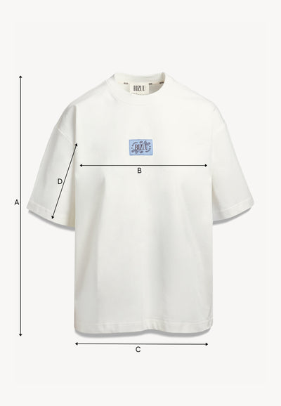 Kremowy t-shirt oversize PARADISO z logo