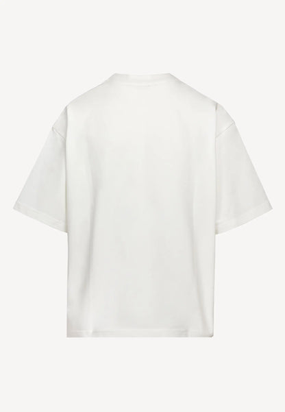 Kremowy T-shirt oversize z grafiką VIORA